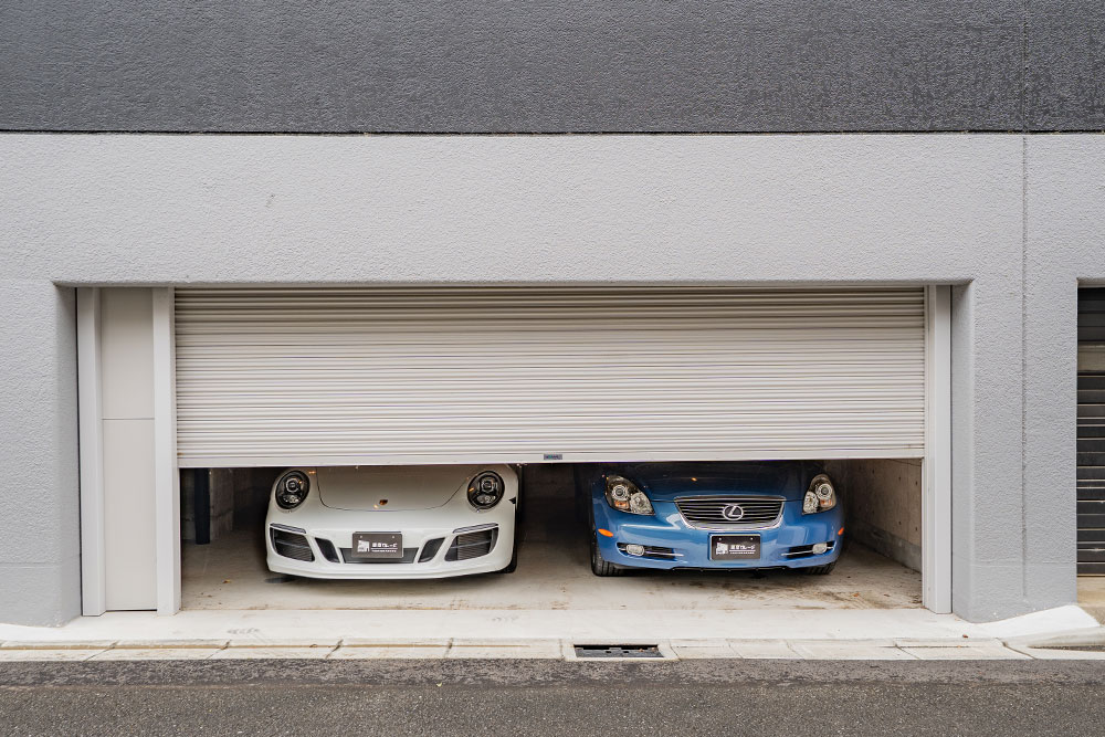 ガレージに駐車した911CarreraS&SC430