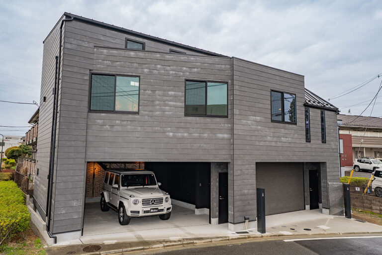 鎧張り×レンガ壁、吹抜け1R+並列2台ガレージ｜京王堀之内駅 歩12分